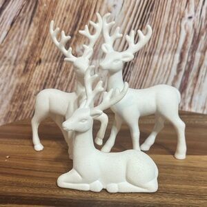 Elegant White Reindeer Figurines Set
